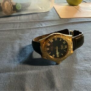 Invicta Gold and Black Watch with Roman Numerals
